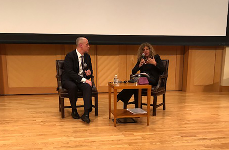 College Dean Chris Celenza speaks with Eni Chair Emma Marcegaglia on a stage