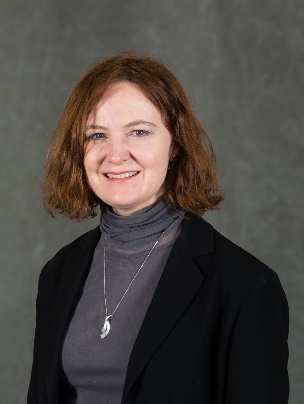 Two College Professors Selected for Prestigious President’s Awards for