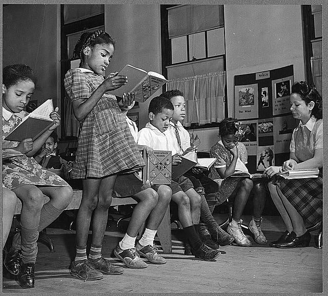 Children reading in a classroom