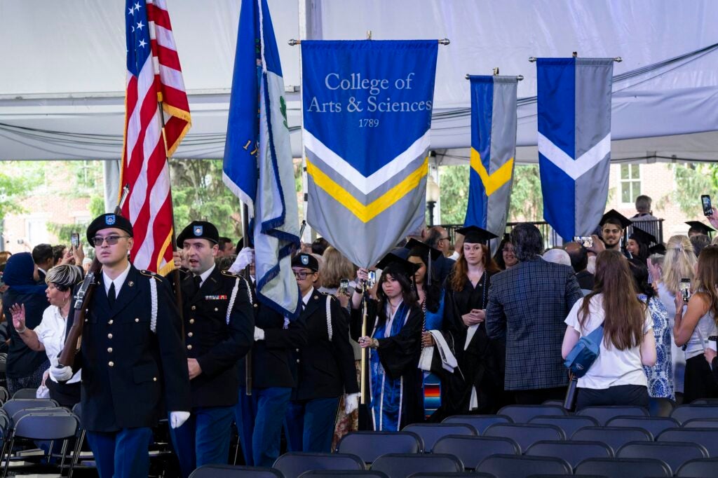 Students walk into the 2025 College of Arts & Sciences Commencement ceremony
