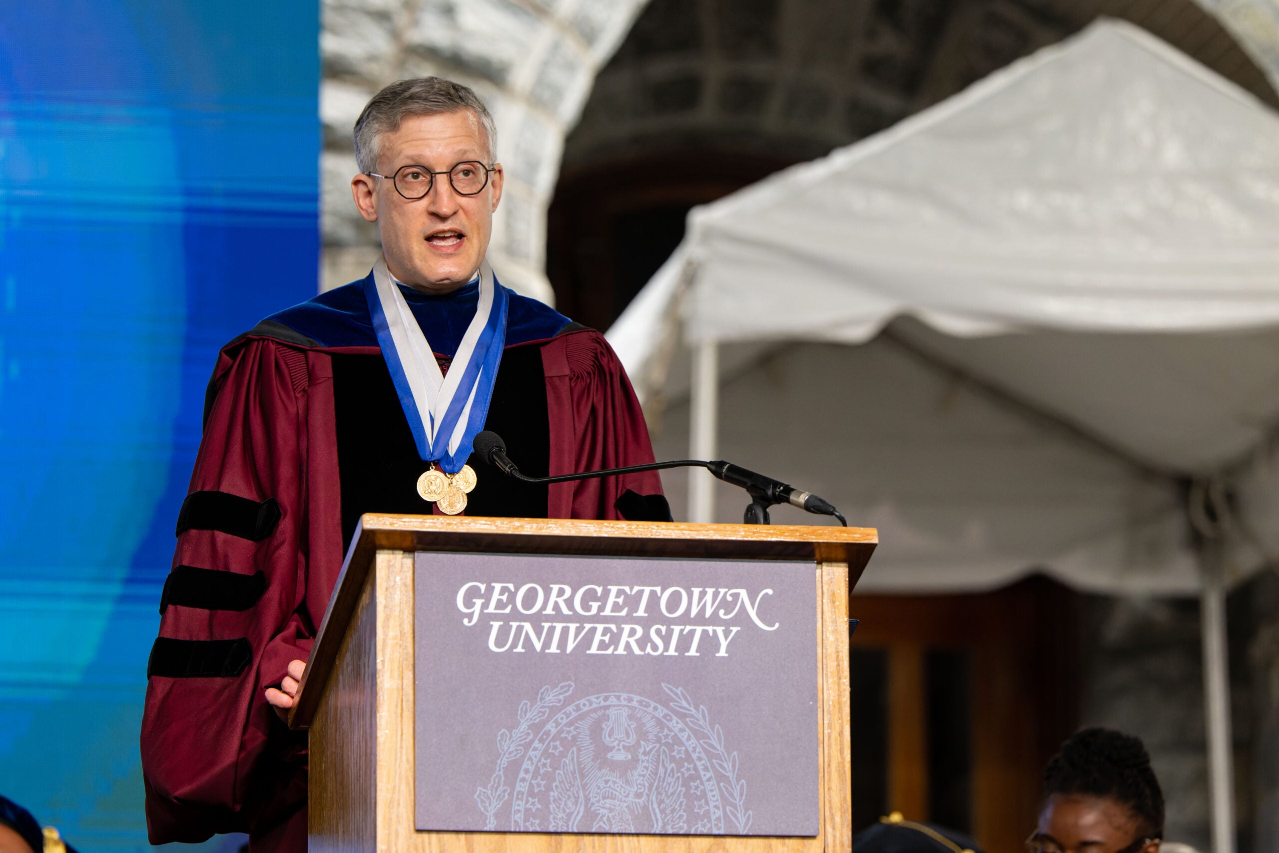 Dean Edelstein at graduation podium