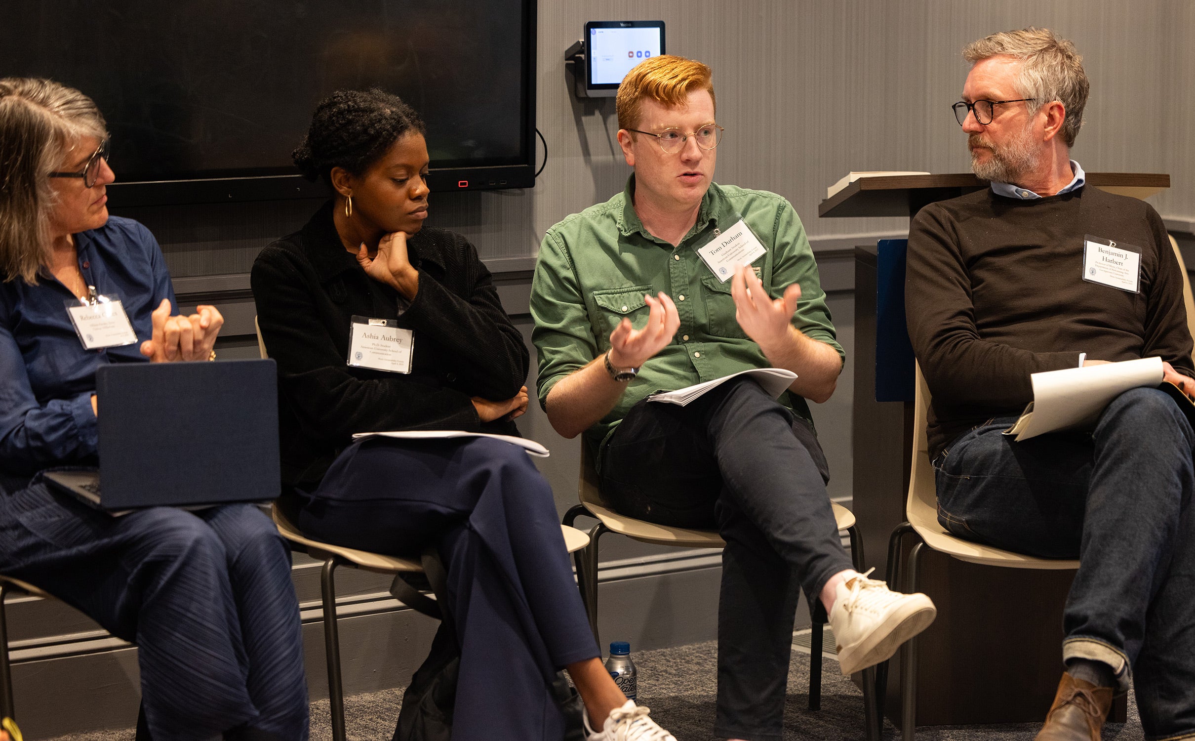 Dr. Harbert and others discussing Music