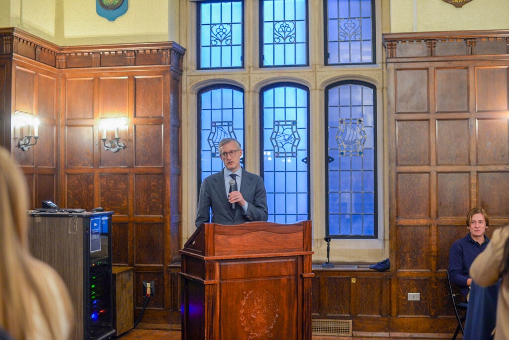 The dean of Georgetown University College of Arts & Sciences speaking during a reception.