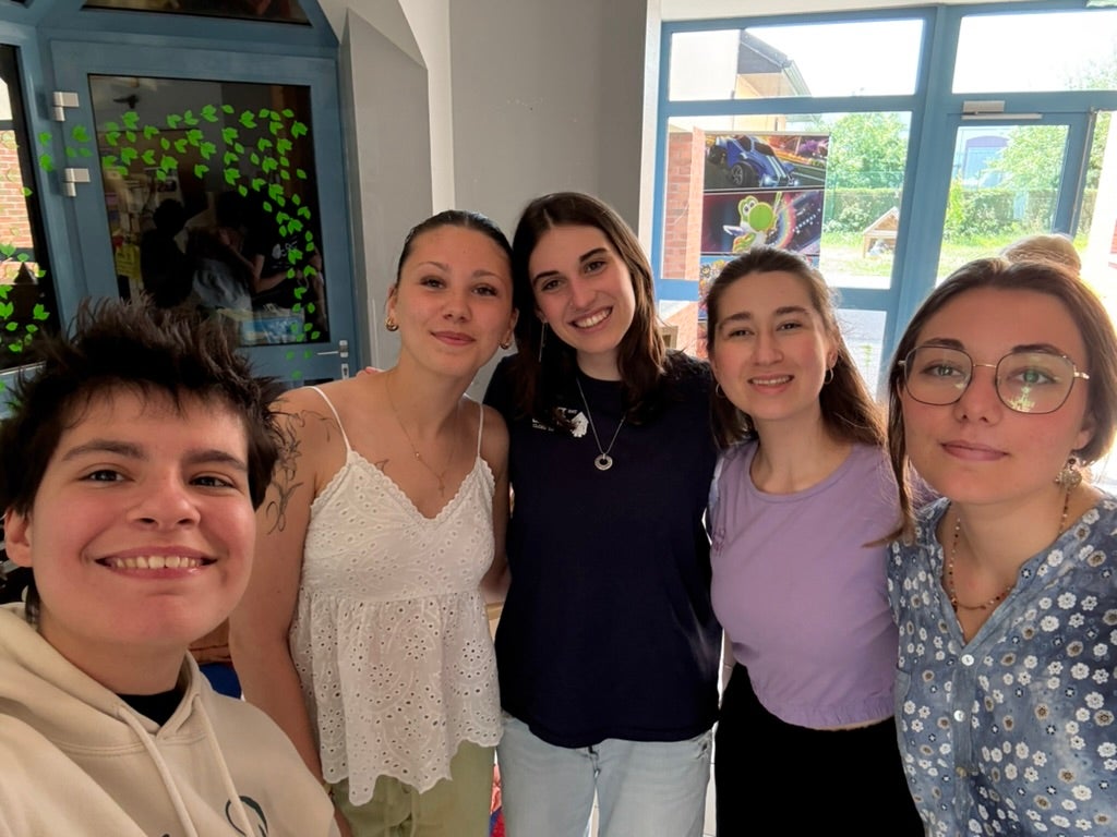A Georgetown University student and four of her internship colleagues in France.