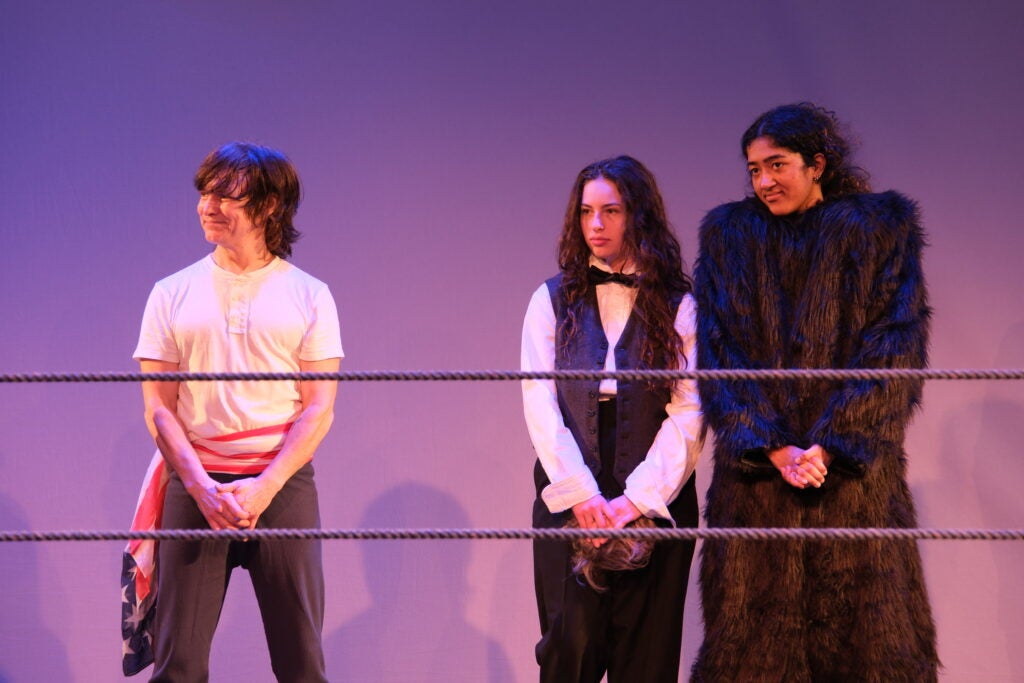 Performers on stage at the Davis Performing Arts Center