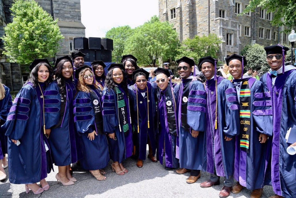 Henderson and fellow members of the Black Law Students Association at the 2018 Georgetown University Law Center Commencement on May 20, 2018.