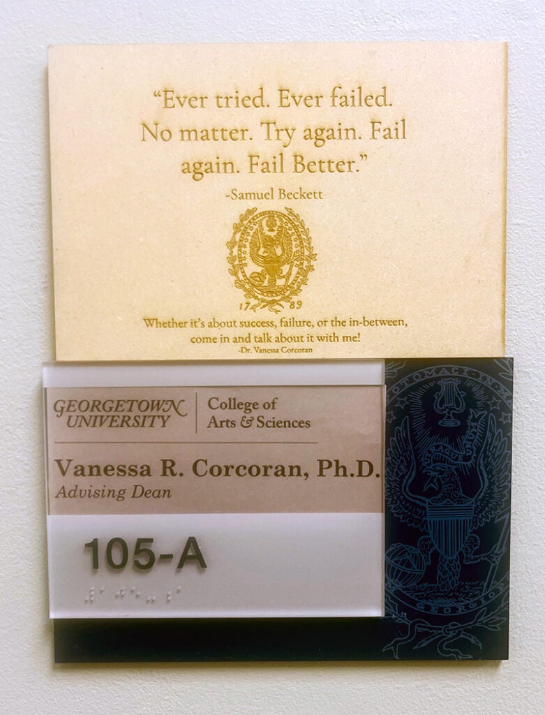 An engraved wooden plaque with a quote from the Irish poet, playwright